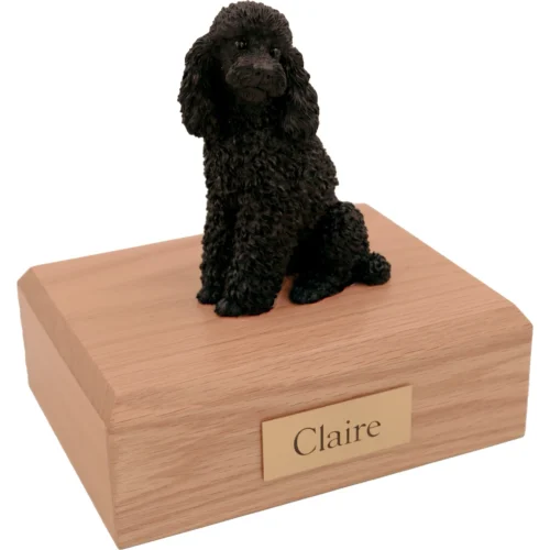 Memorial cremation urn with sitting black Poodle dog figurine, oak finish