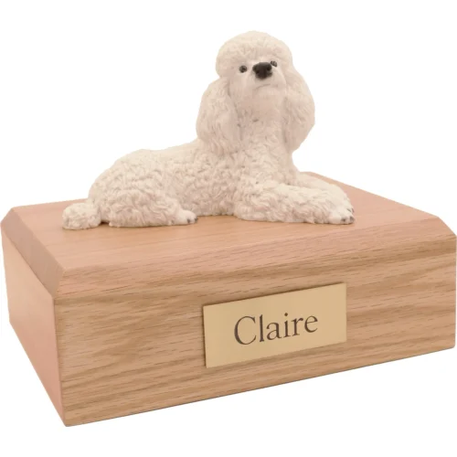 Memorial cremation urn with laying white Poodle dog figurine, oak finish