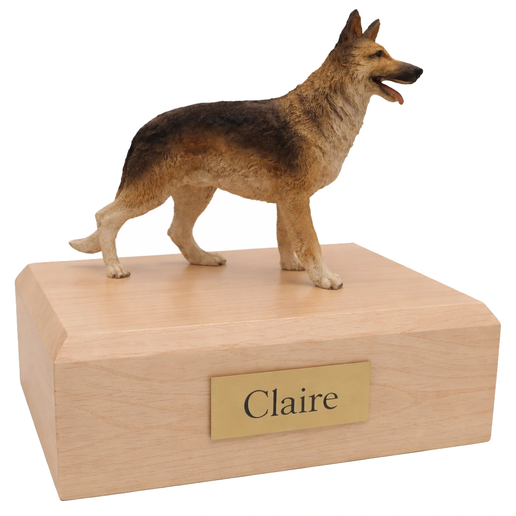 Memorial cremation urn with standing German Shepherd dog figurine, maple finish