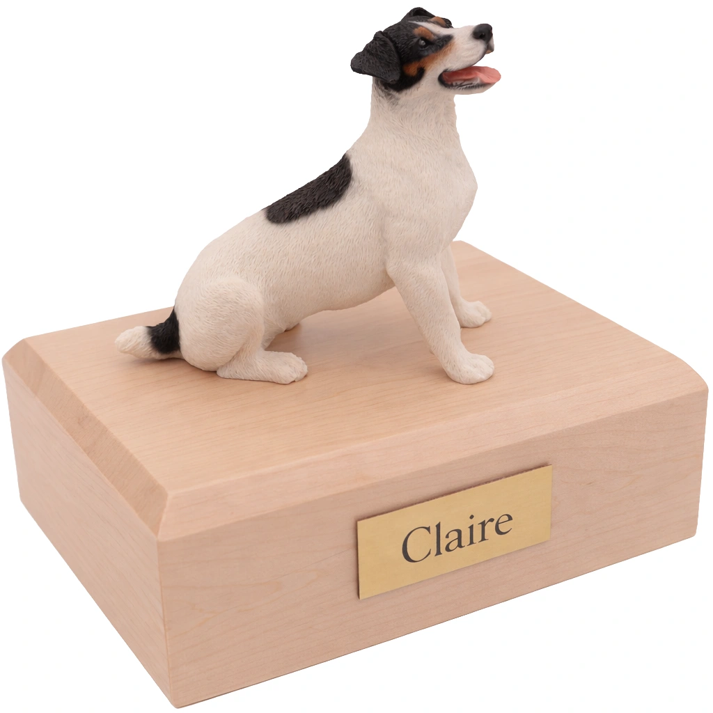 Memorial cremation urn with sitting black and white Jack Russell Terrier dog figurine, maple finish