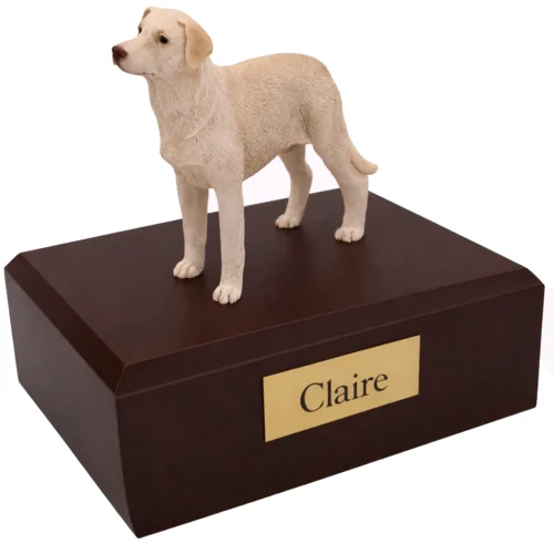 Memorial cremation urn with standing yellow Labrador Retriever dog figurine, walnut finish