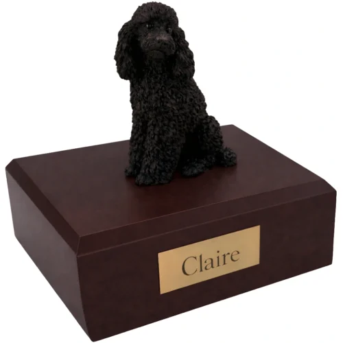 Memorial cremation urn with sitting black Poodle dog figurine, walnut finish