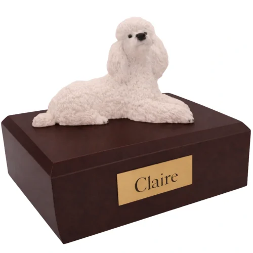 Memorial cremation urn with laying white Poodle dog figurine, walnut finish