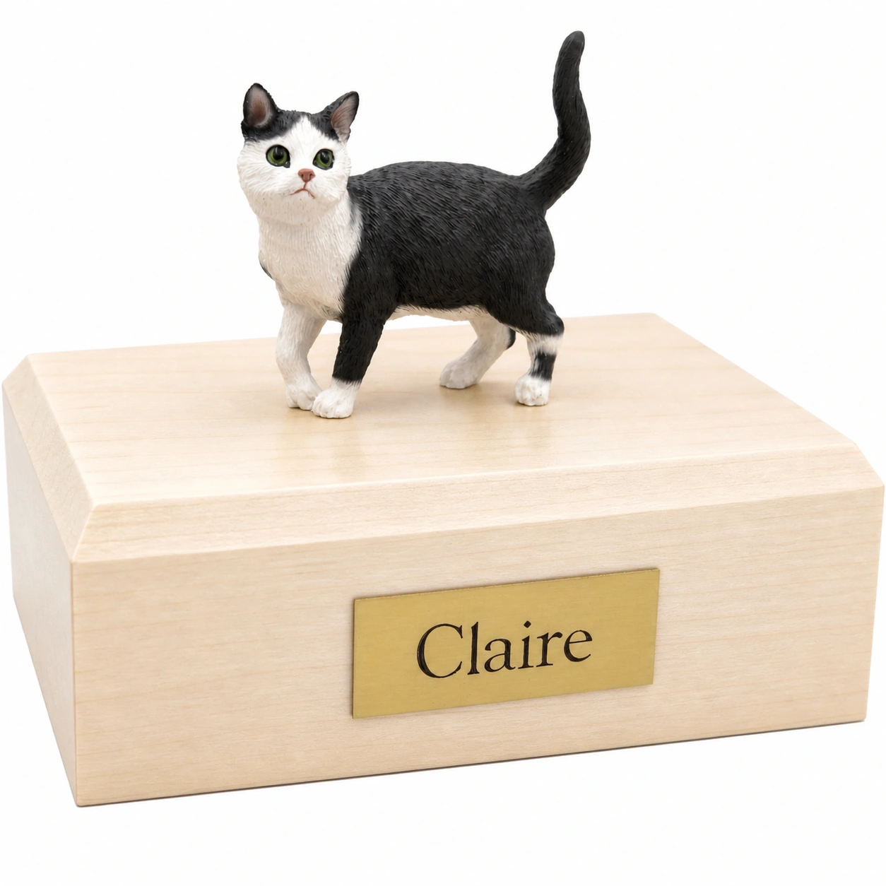 Memorial cremation urn with standing black and white tuxedo cat figurine, maple finish