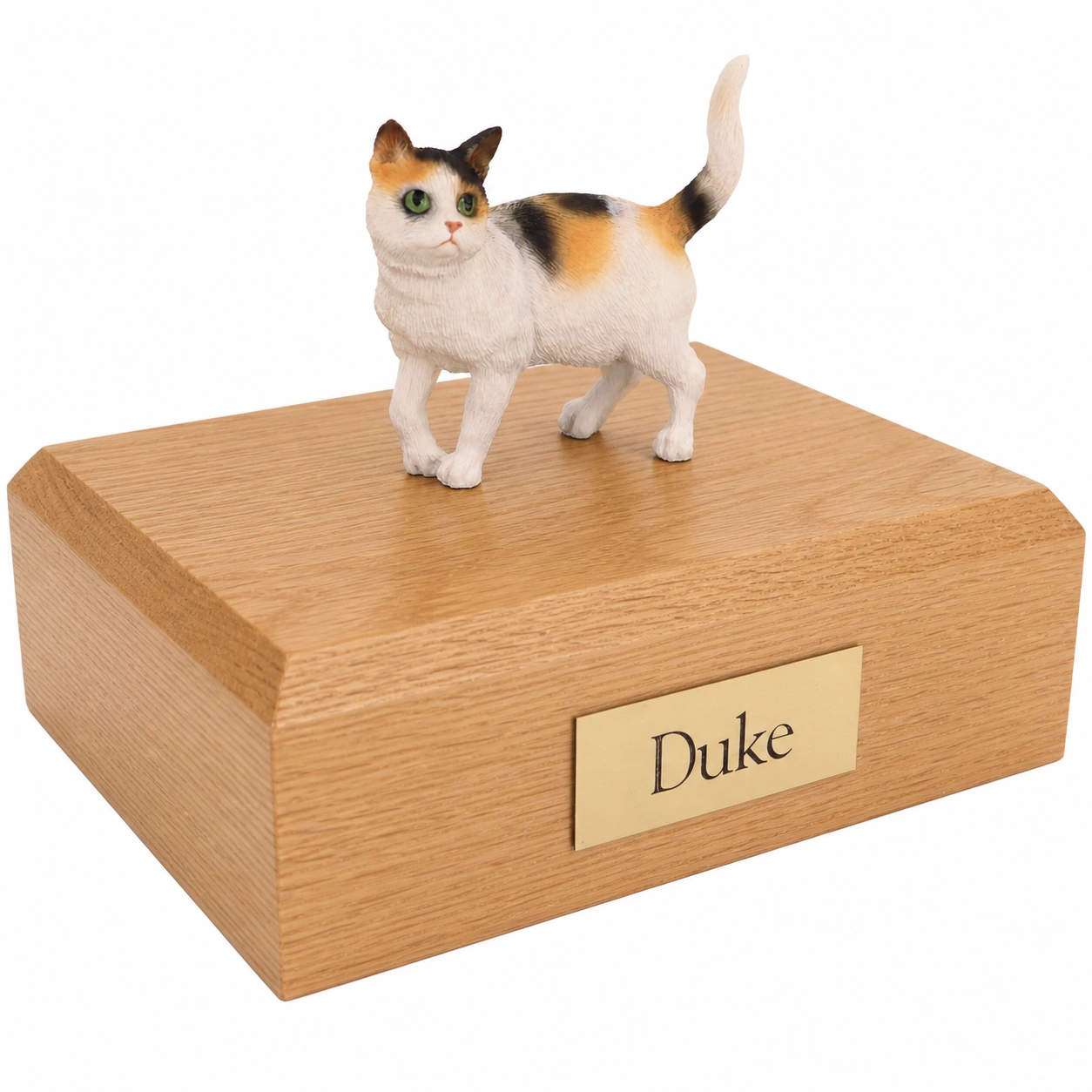 Memorial cremation urn with standing tri-color shorthaired cat figurine, oak finish