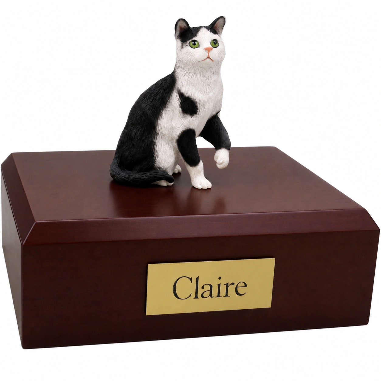 Memorial cremation urn with sitting black and white shorthaired tuxedo cat figurine, walnut finish