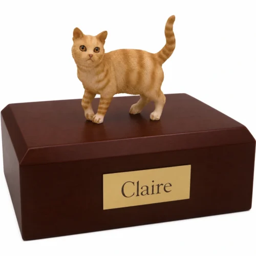 Memorial cremation urn with standing red shorthaired tabby cat figurine, walnut finish