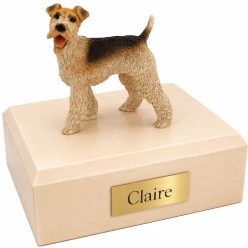 Memorial cremation urn with standing Wire Fox Terrier dog figurine, maple finish