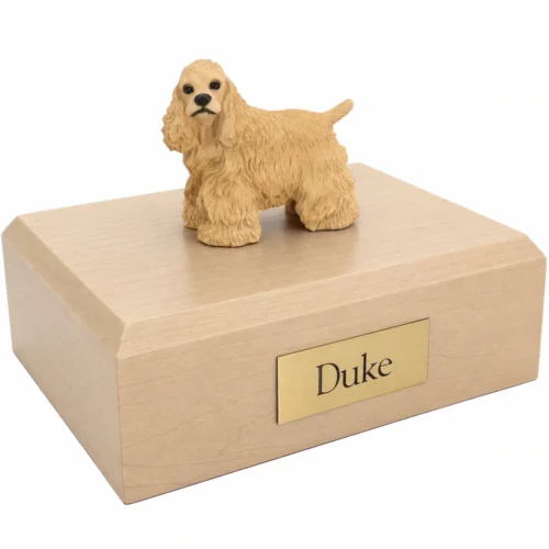 Memorial cremation urn with standing blonde Cocker Spaniel dog figurine, maple finish