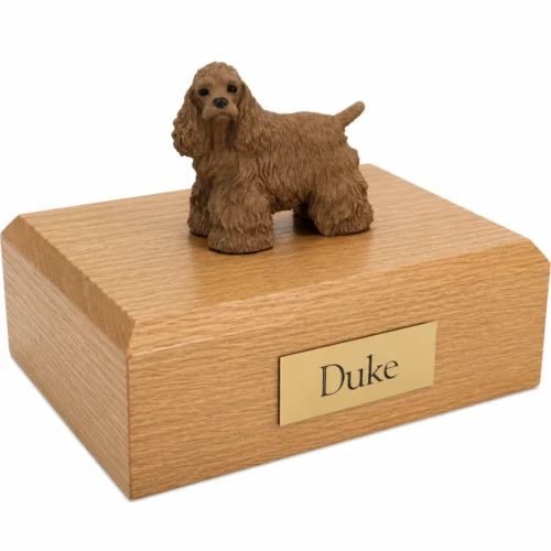 Memorial cremation urn with standing brown Cocker Spaniel dog figurine, oak finish