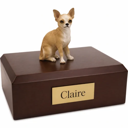 Memorial cremation urn with standing tan and white Chihuahua dog figurine, walnut finish
