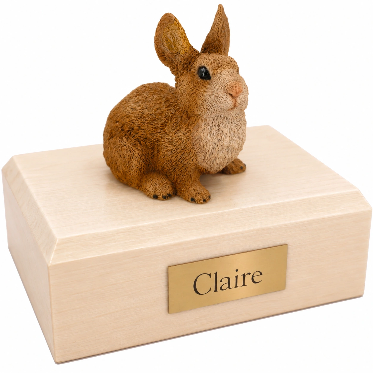 Memorial cremation urn with brown and white rabbit figurine, maple finish